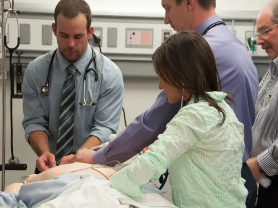 Medical Students with practice dummy