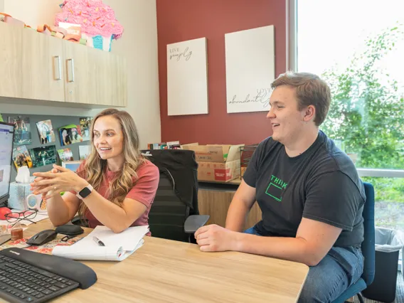 A student talking with his advisor