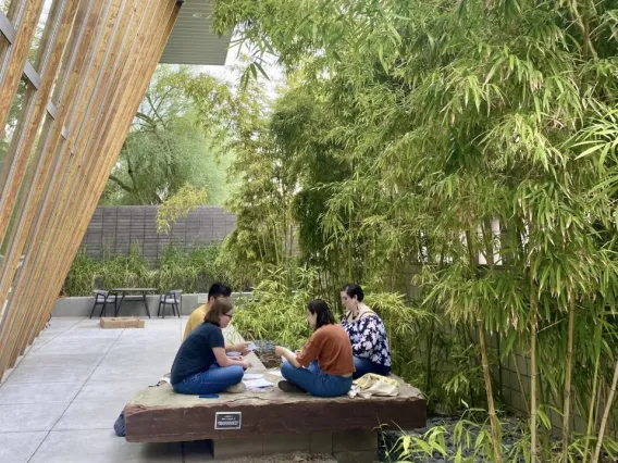 students sitting outside of the poetry center