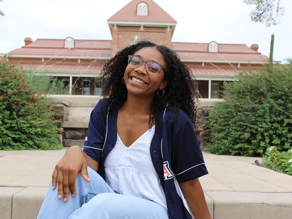 Headshot of Megan Bime in front of Old Main