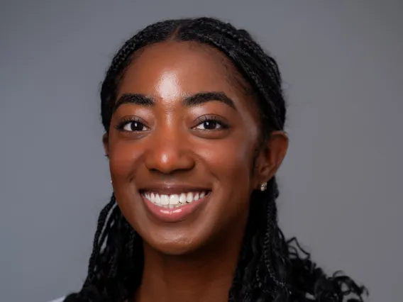 person's headshot with grey background