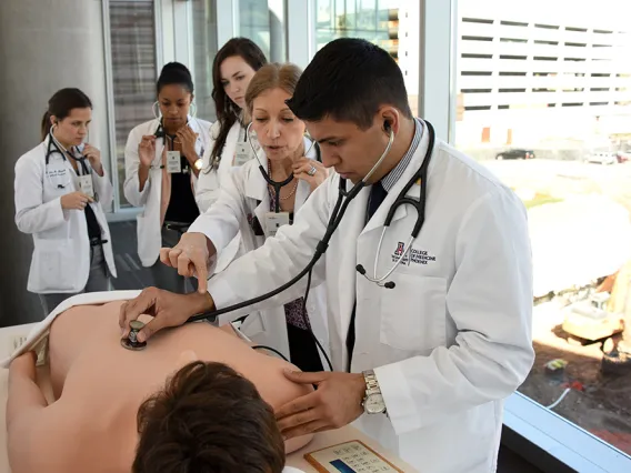 Student in white coat