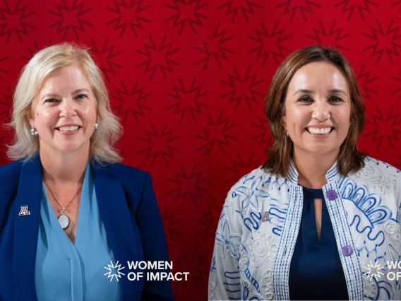 two women with red background, white text in corner reading women of impact