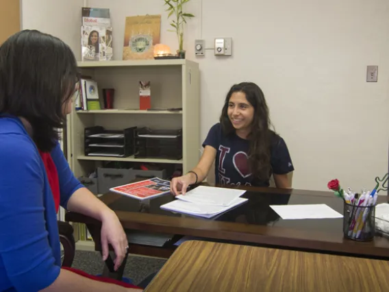 Student meeting with advisor