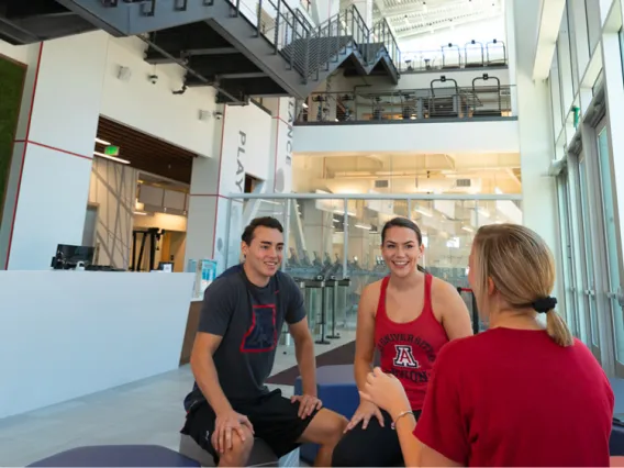 Students taking a break at the new Rec center in the Honors Village