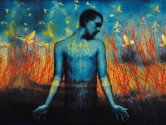 Purgatorio image of man caught between heaven and hell