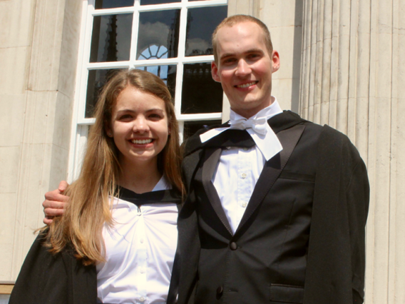 UA Honors alumni Travis Sawyer and Jeannie Wilkening at their graduation from the University of Cambridge