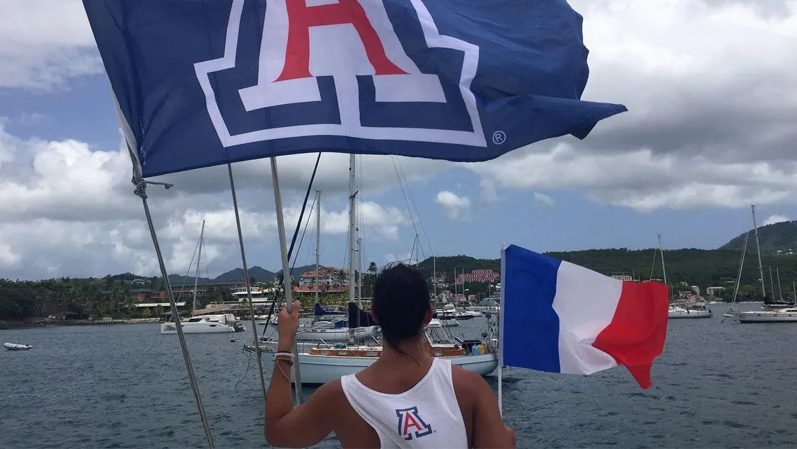 U of Az flag on boat