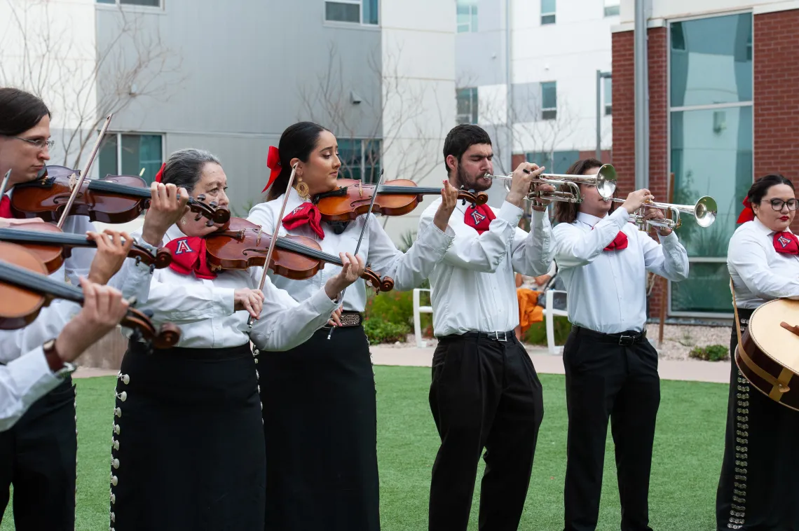 Mariachi band playing at HSI Faculty event