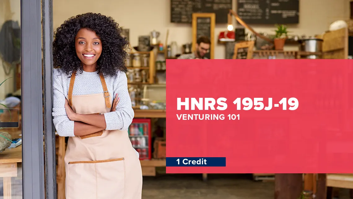 Smiling entrepreneur in front of her storefront