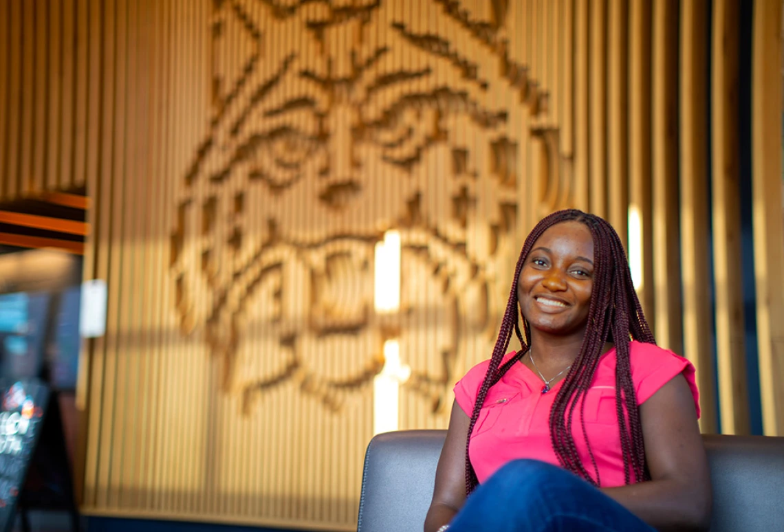 Black female student in lobby of Honors Village