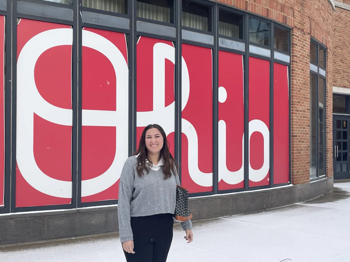 woman standing in front of Ohio sign 