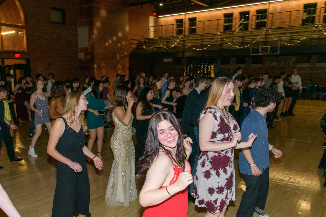 Students dancing in Bear Down gym.