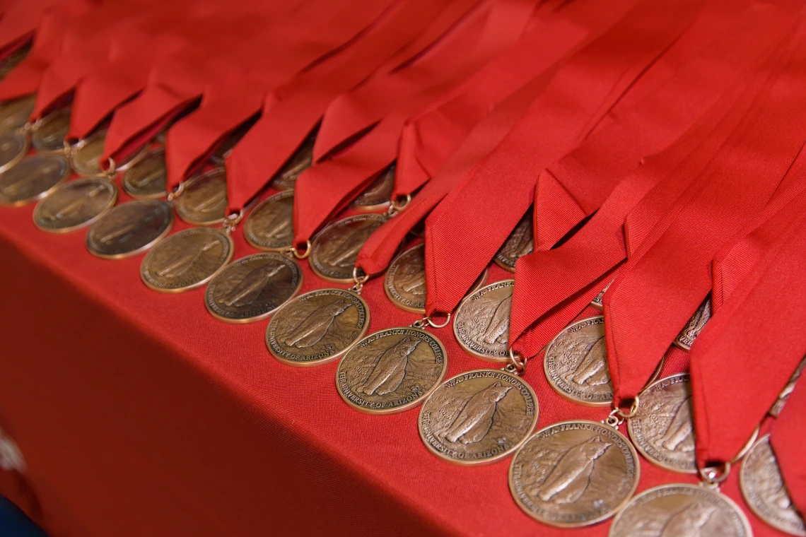 honors medallions with red ribbons