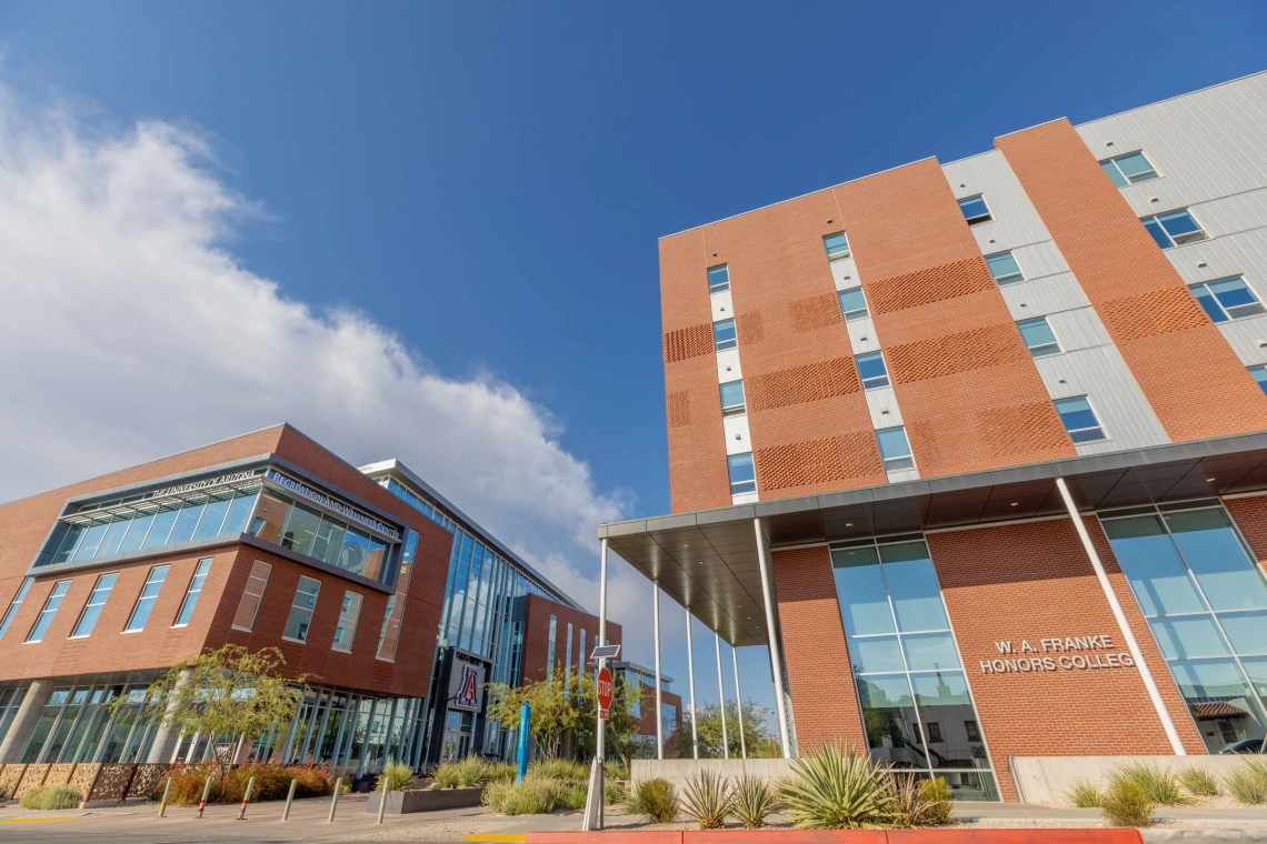 two buildings with blue sky background