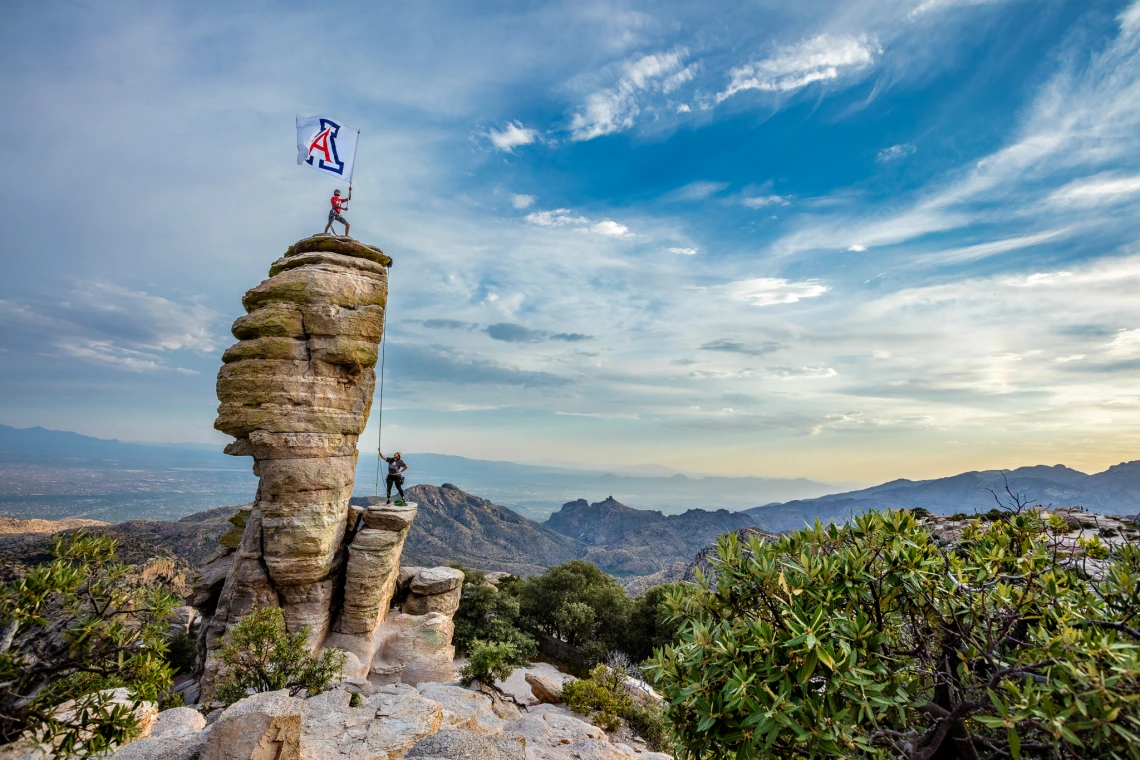 U of A flag on peak at Windy Point