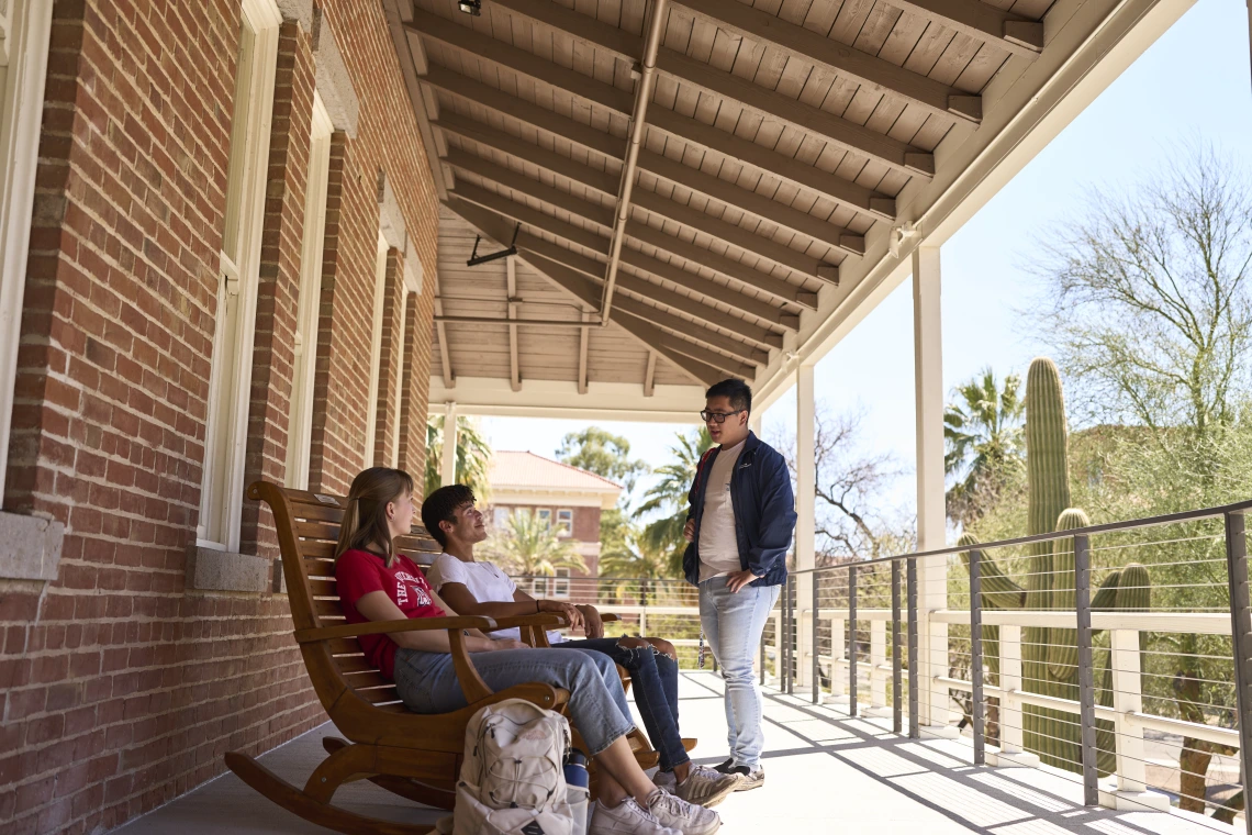 Students sitting outside Old Main