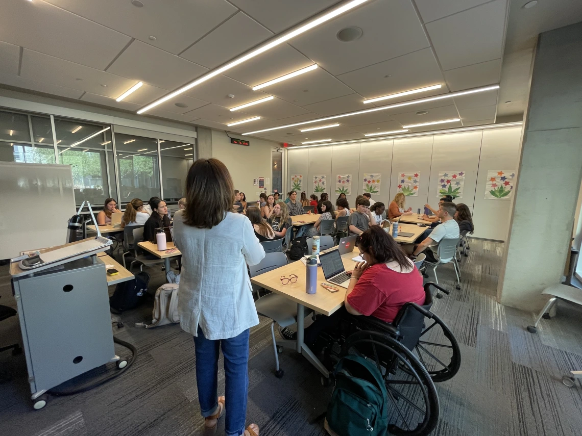 students sitting together at tables