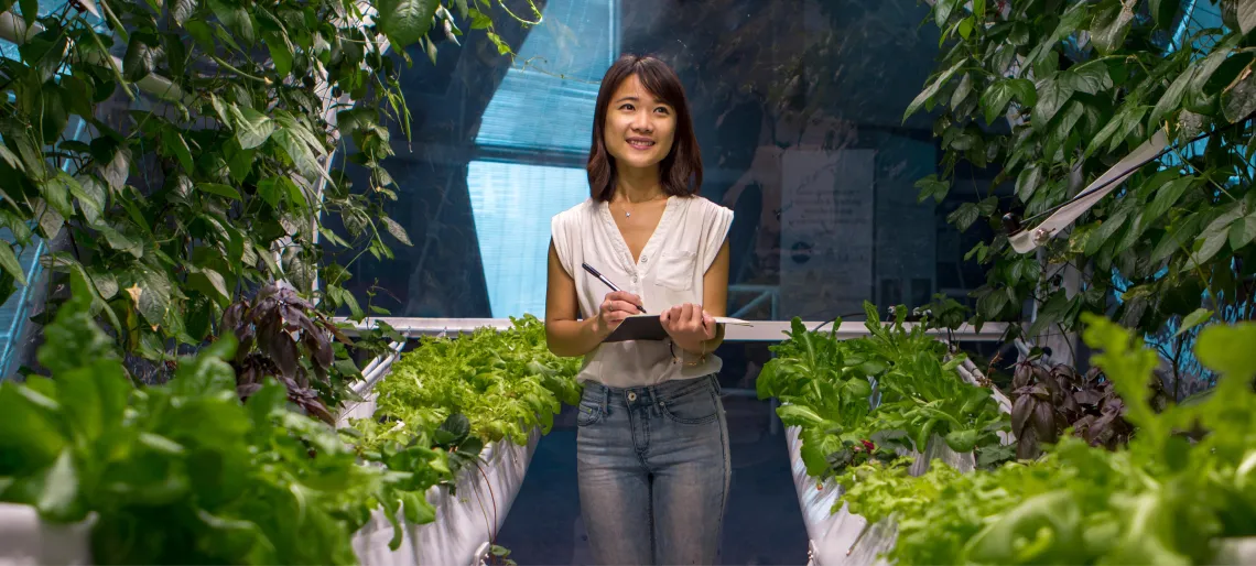 Student in plant lab