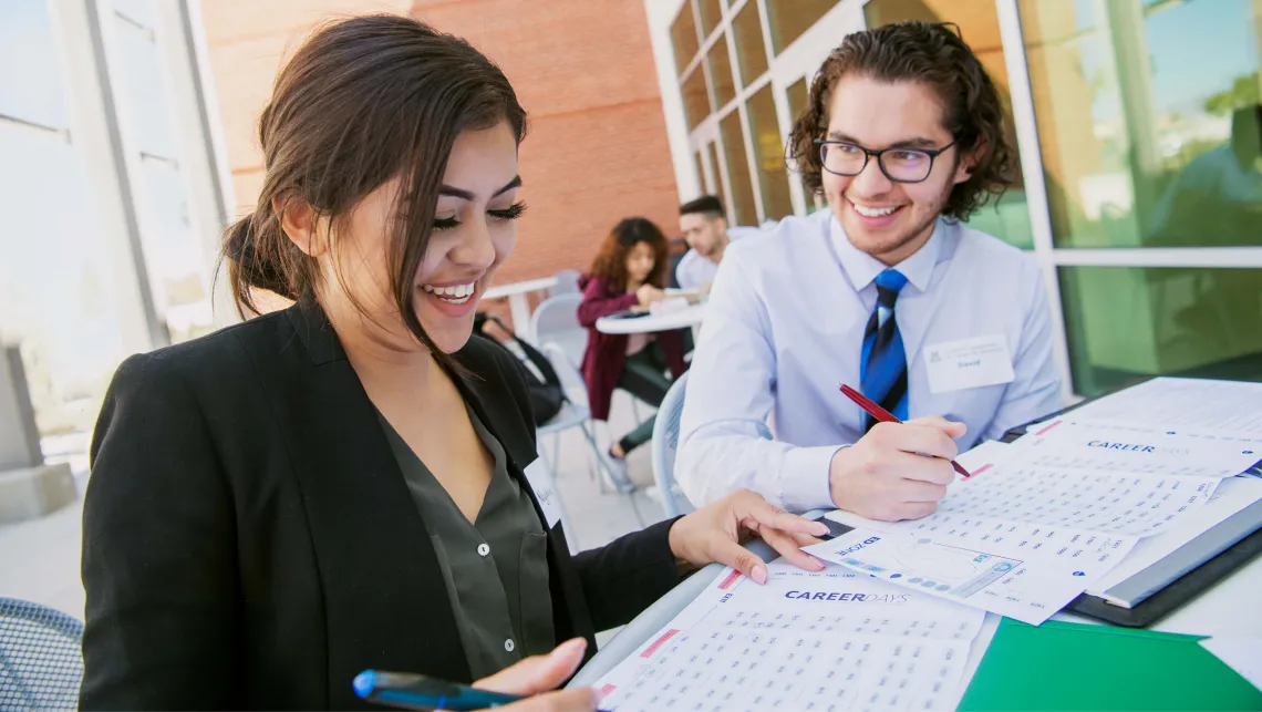 Hispanic Students working on campus