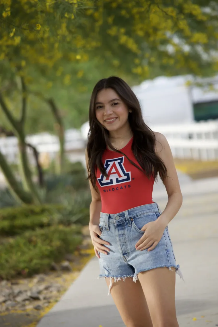 student wearing red University of arizona shirt