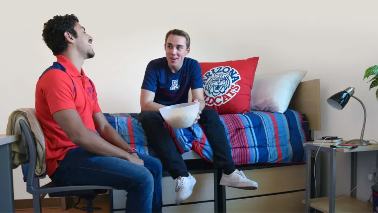 Students hanging out in a dorm room