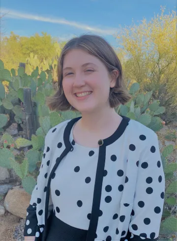 person in front of desert background