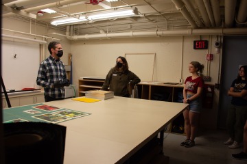 students visiting the resotration room of the art museum