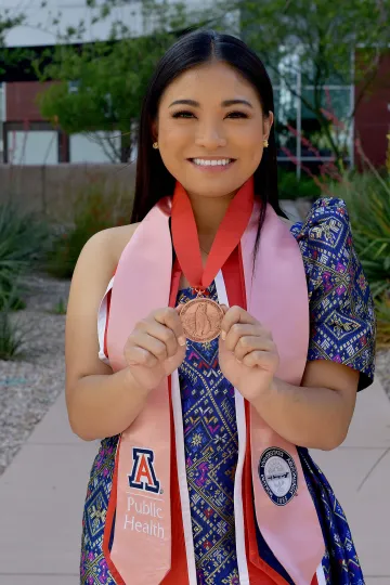 graduating senior headshot with medallion