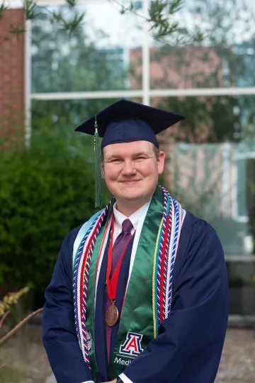 graduating senior headshot with medallion