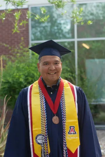 graduating senior headshot with medallion