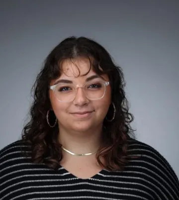 Student headshot with grey background