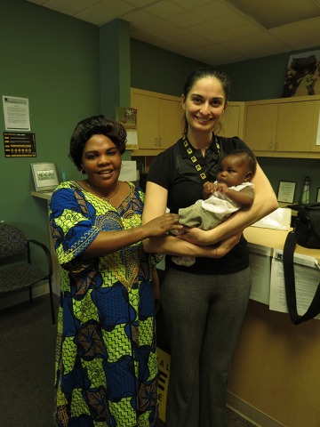Client with baby at IRC pre-natal care.