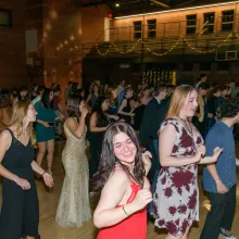 Students dancing in Bear Down gym.