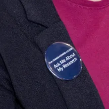 Button saying "Ask me about my research"