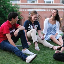 Students sitting on the grass