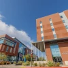 two buildings with blue sky background
